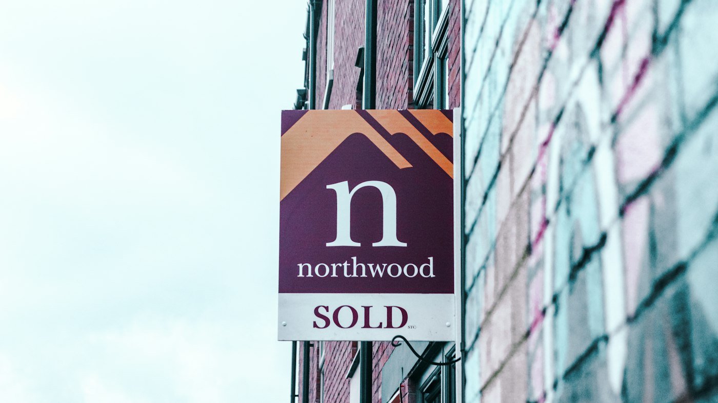 Sold sign outside a renovated home